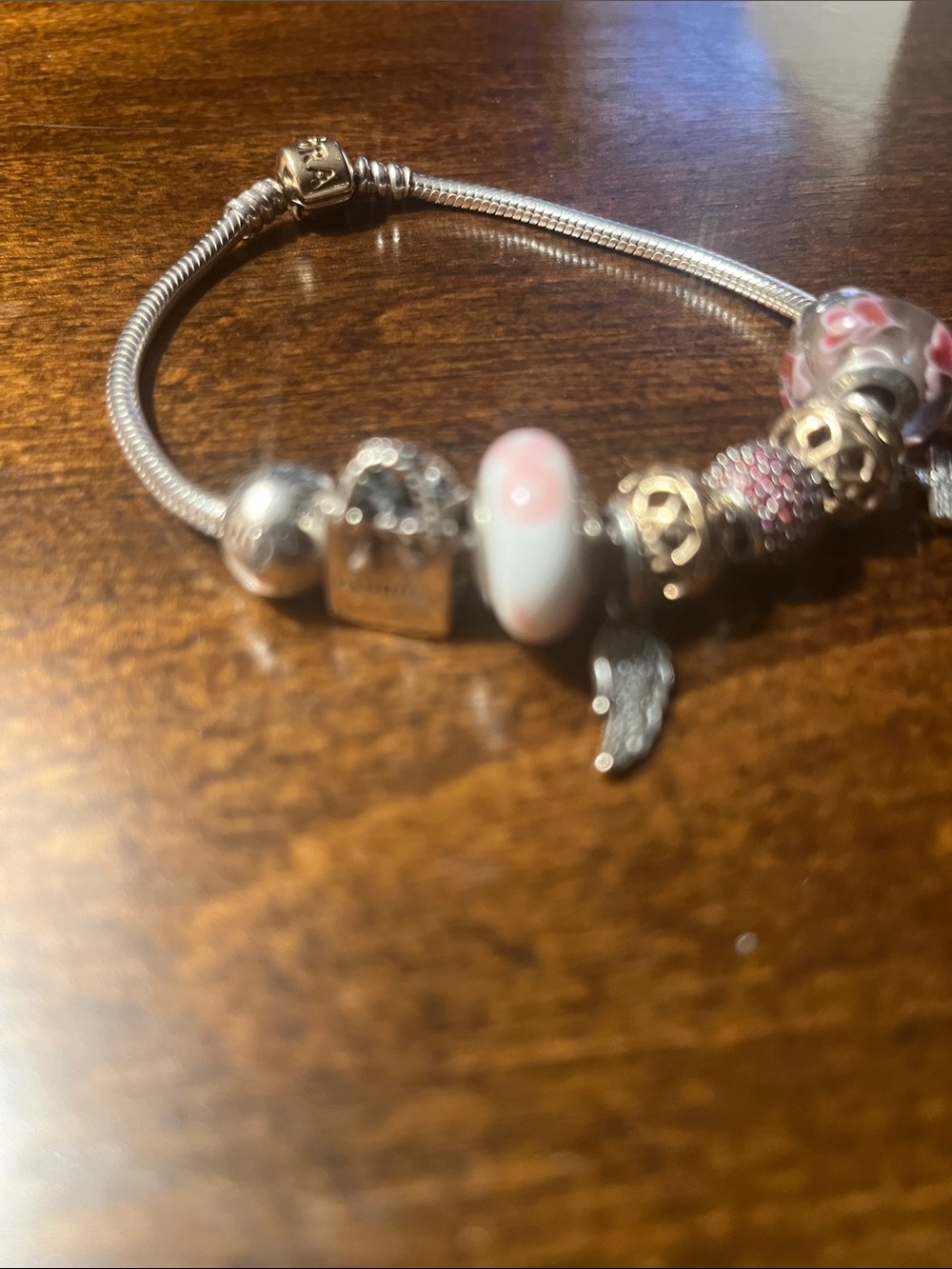 Pandora Silver Bracelet with 10 Charms with Gold and Silver Accents - Picture 5 of 8